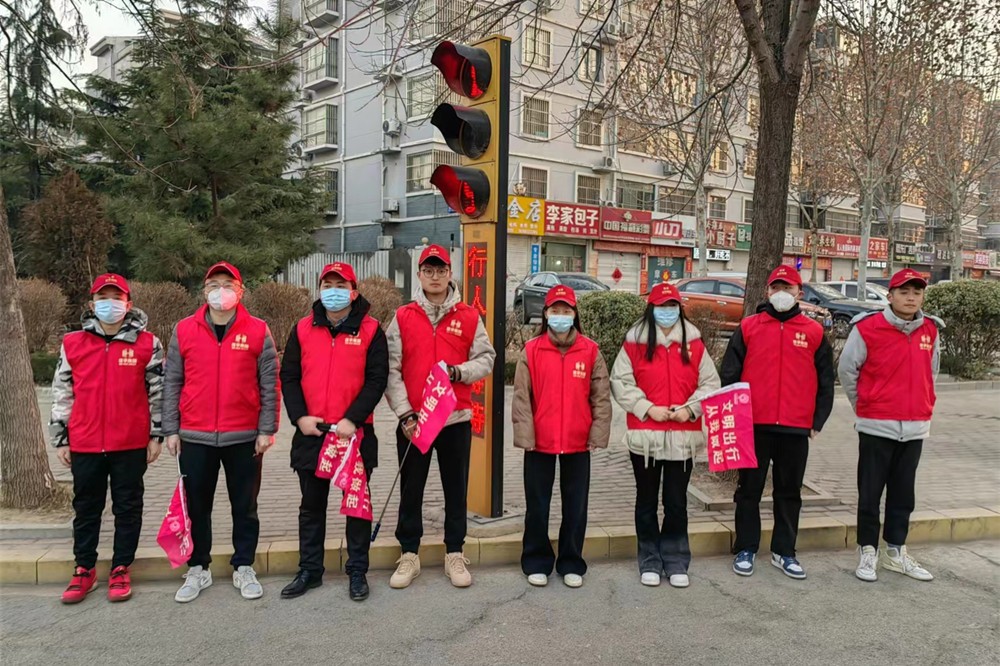 信华集团开展文明交通志愿服务行动